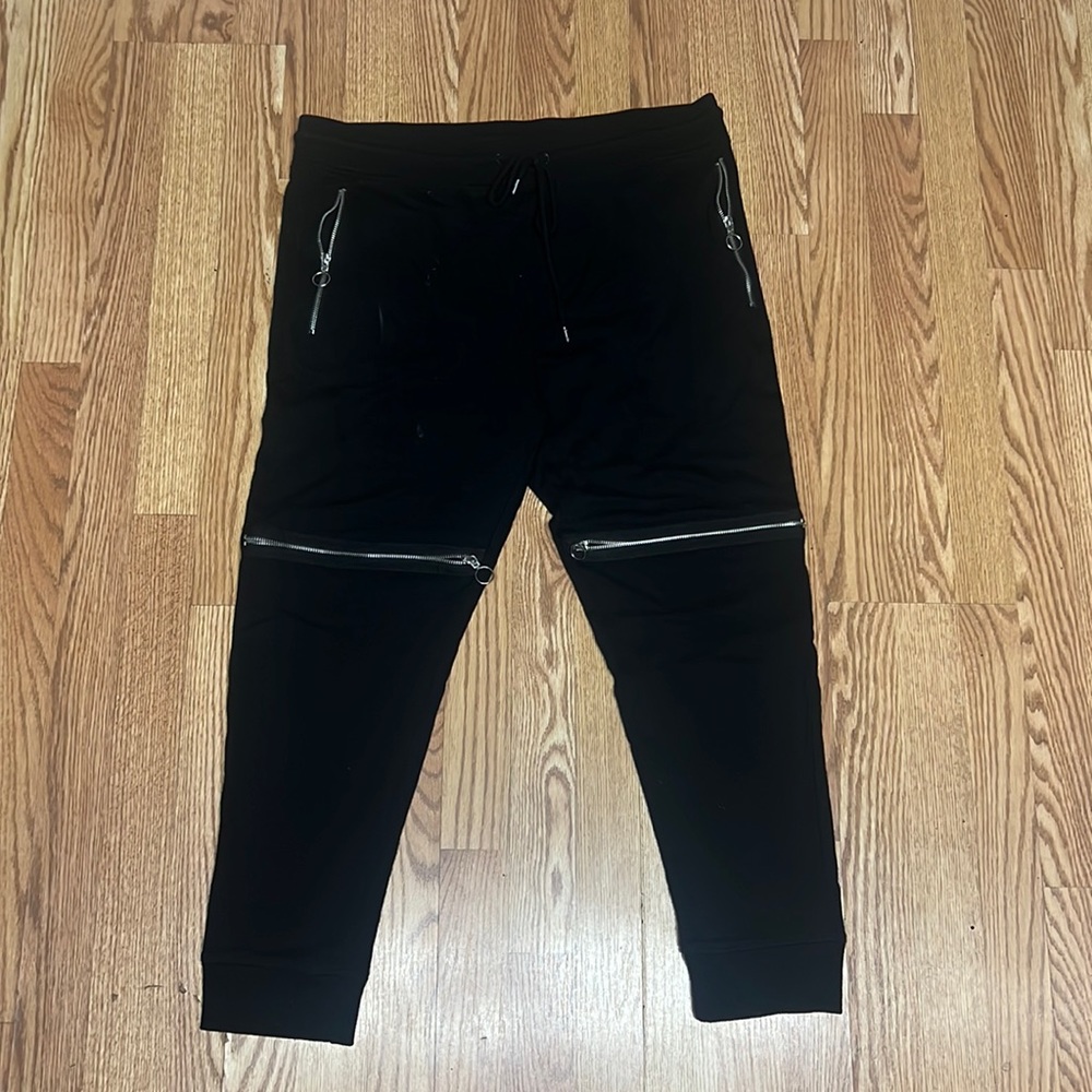 Stylish black joggers with faux zippers